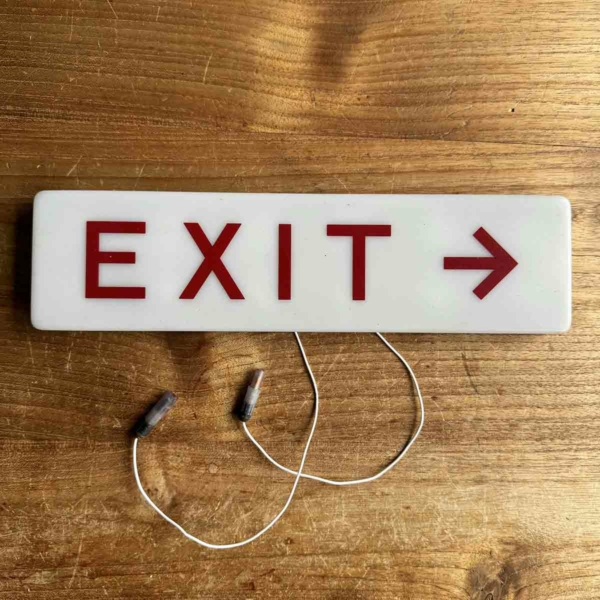 Boeing emergency exit sign for sale.