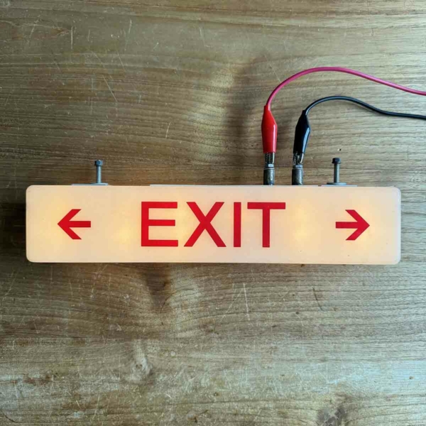 Boeing emergency exit sign for sale.