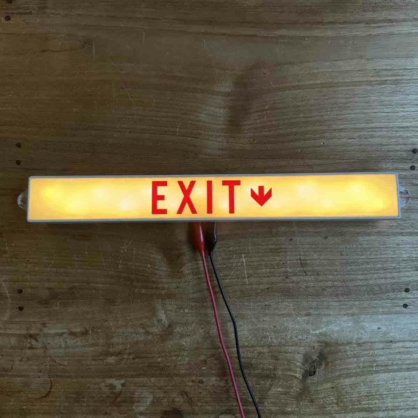 Boeing emergency exit sign for sale.