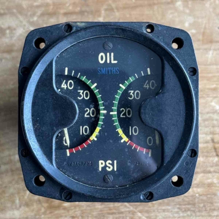 Dual gage oil pressure indicator for sale.